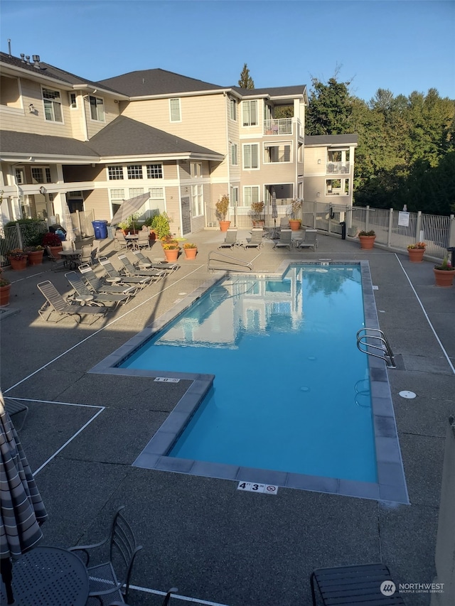 view of pool featuring a patio