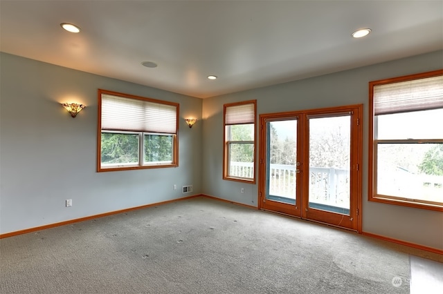 view of carpeted spare room