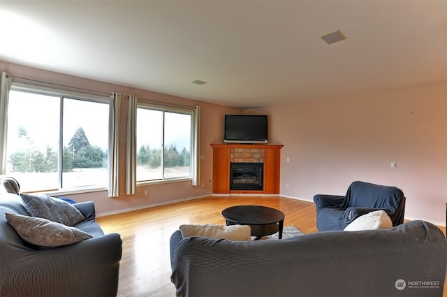 living room with light hardwood / wood-style floors