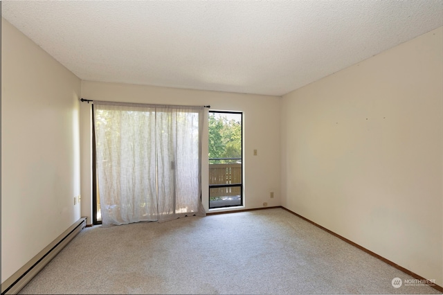 unfurnished room featuring a baseboard radiator, a textured ceiling, and carpet floors