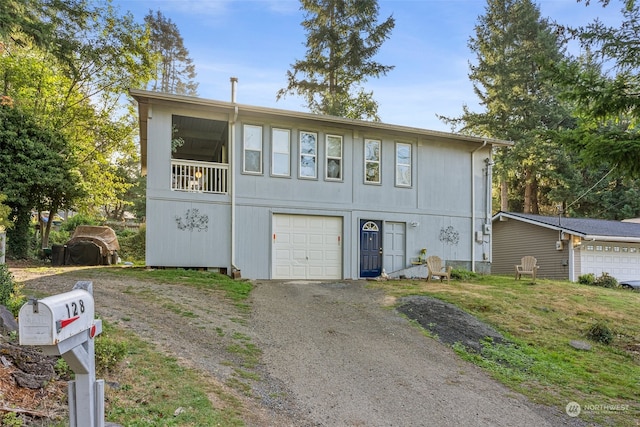 view of front of property with a garage