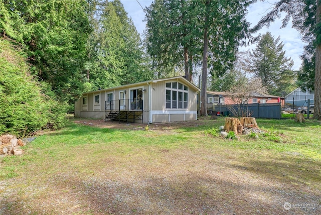 exterior space featuring a front lawn