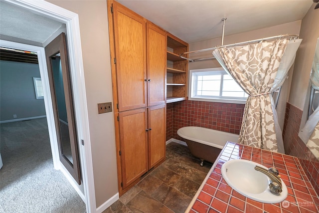 bathroom featuring vanity, tile walls, and plus walk in shower