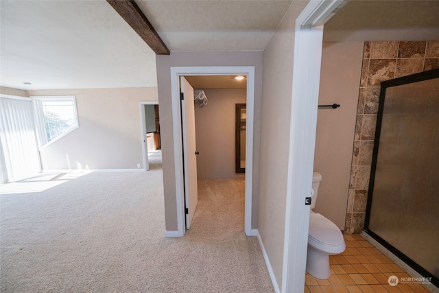 corridor with light carpet and beamed ceiling