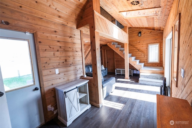 interior space featuring a wealth of natural light, vaulted ceiling, and wooden ceiling