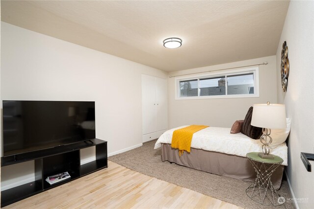4109 N Huson St, Tacoma, WA 98407 - bedroom featuring baseboards and wood finished floors