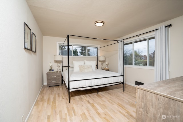 bedroom featuring wood-type flooring