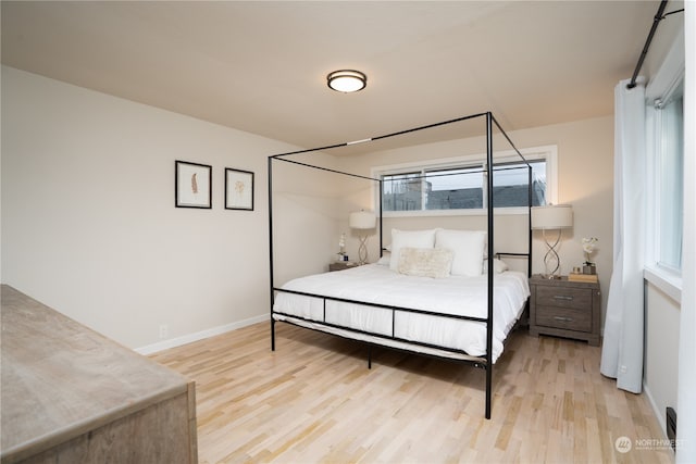 bedroom featuring light hardwood / wood-style flooring