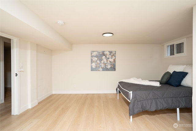 bedroom with light hardwood / wood-style floors