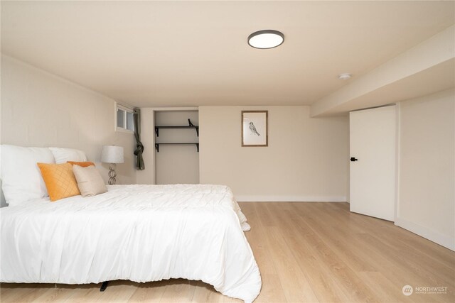 4109 N Huson St, Tacoma, WA 98407 - bedroom featuring baseboards and light wood-type flooring
