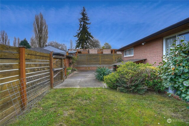 4109 N Huson St, Tacoma, WA 98407 - view of yard featuring a fenced backyard and a patio area