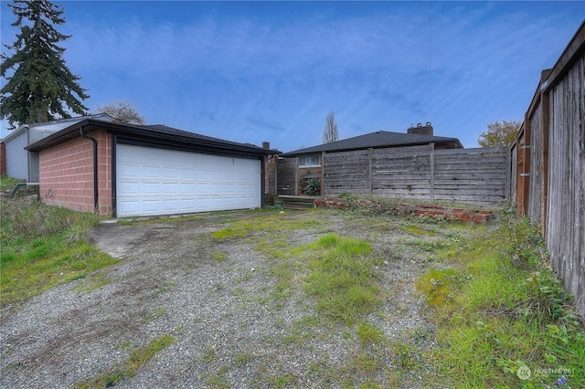 exterior space featuring a garage