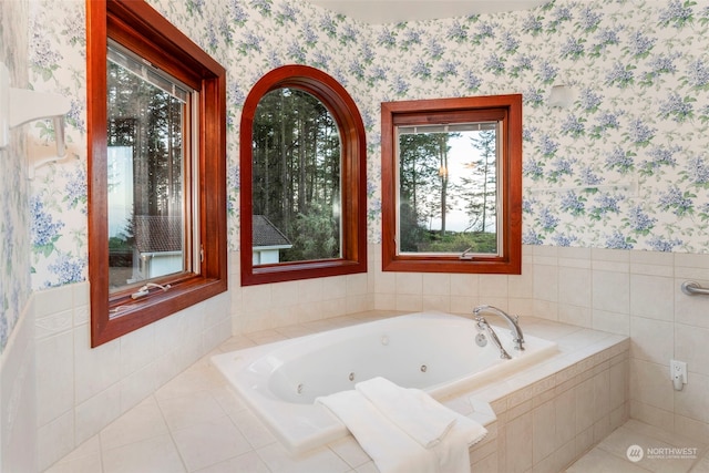 bathroom featuring tiled bath