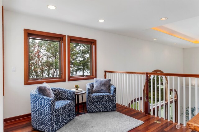 living area featuring hardwood / wood-style floors