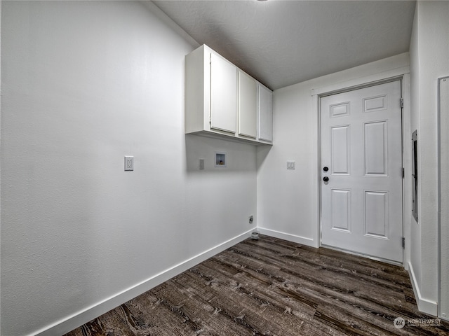 laundry room with cabinets, washer hookup, and dark hardwood / wood-style floors