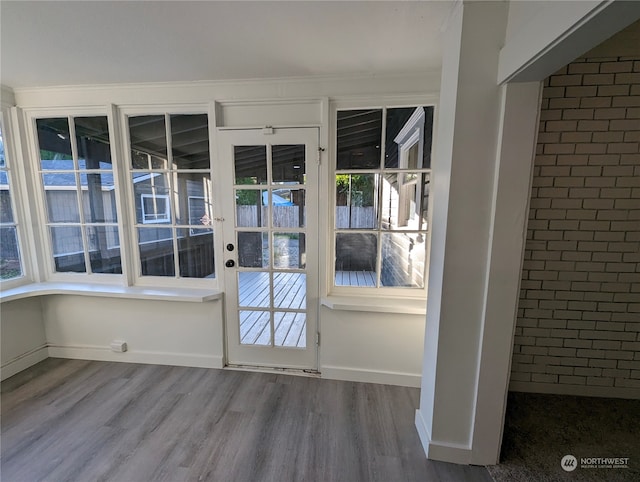 doorway to outside featuring hardwood / wood-style flooring