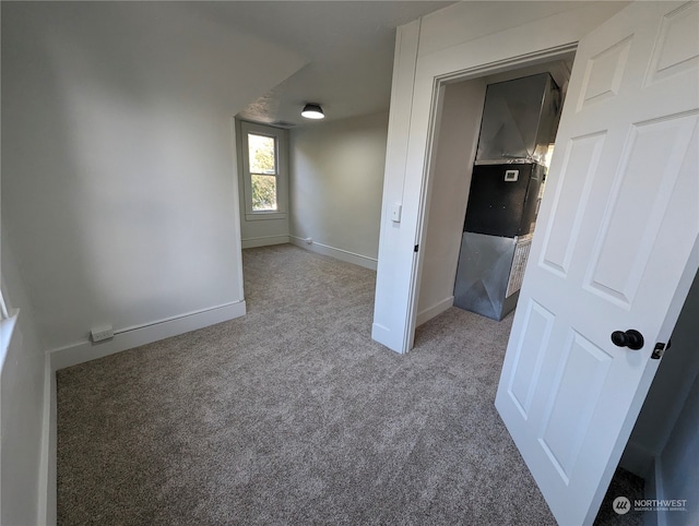 spare room with carpet floors