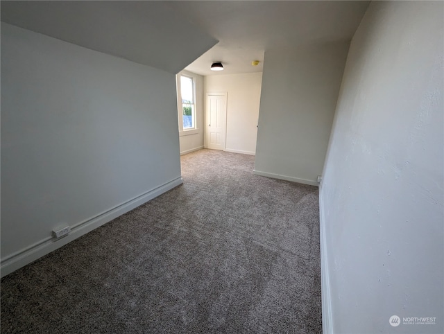 empty room with light colored carpet