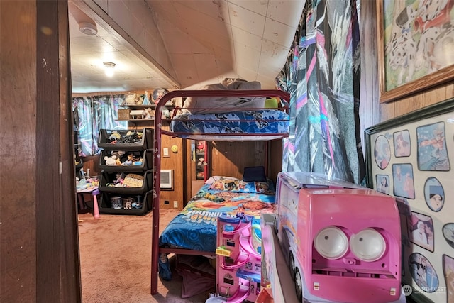 carpeted bedroom featuring vaulted ceiling