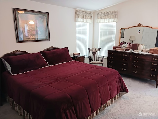 bedroom with light carpet