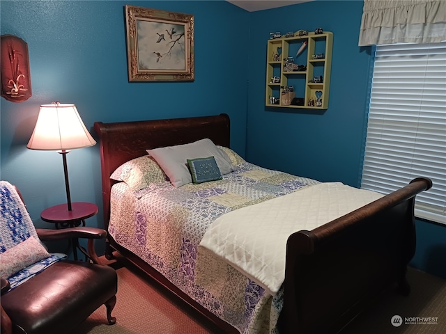 bedroom featuring carpet flooring