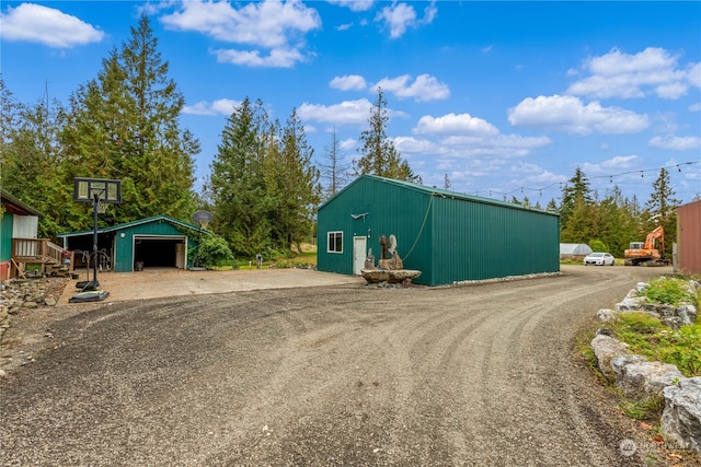 view of outbuilding featuring a garage