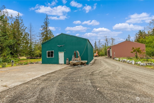 view of outbuilding featuring a garage