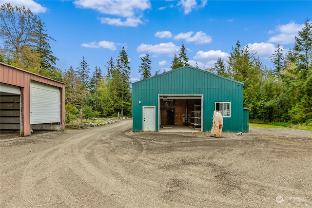 view of outdoor structure with a garage