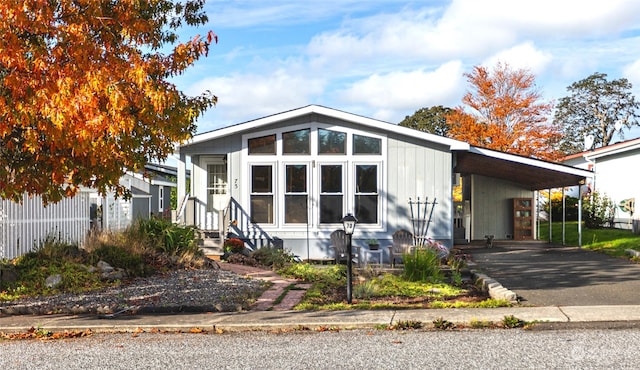 view of front facade with a carport