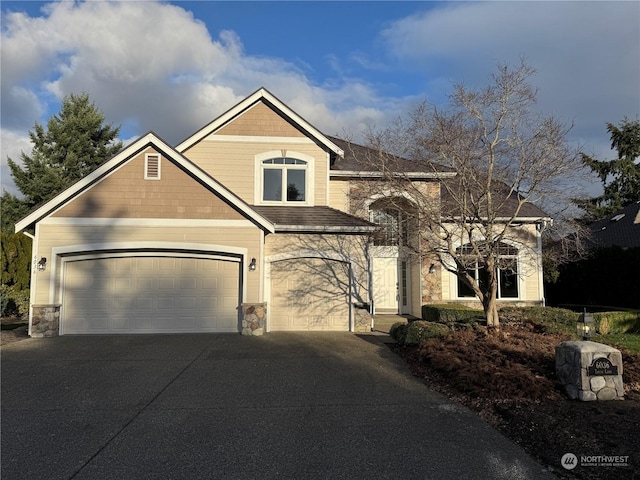 view of front of house with a garage