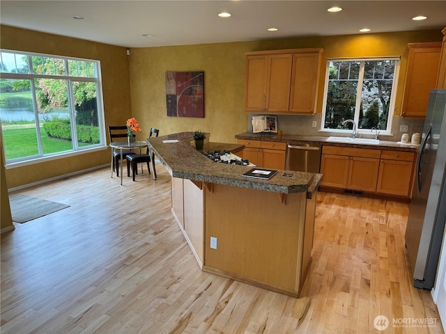 6036 Troon Ln SE, Olympia, WA 98501 - kitchen featuring freestanding refrigerator, stainless steel dishwasher, a sink, light wood-type flooring, and recessed lighting