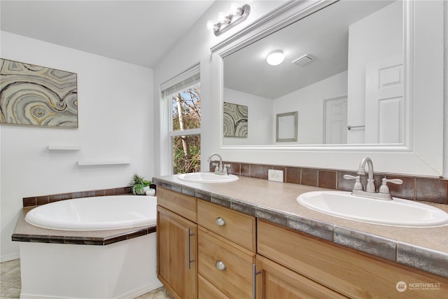 bathroom with a tub, tile patterned flooring, vanity, and vaulted ceiling