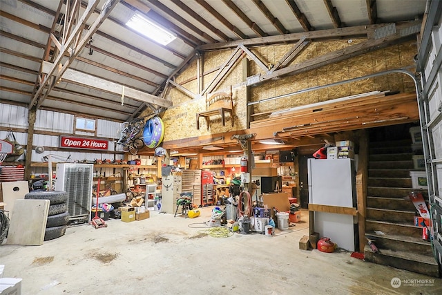 garage with a workshop area