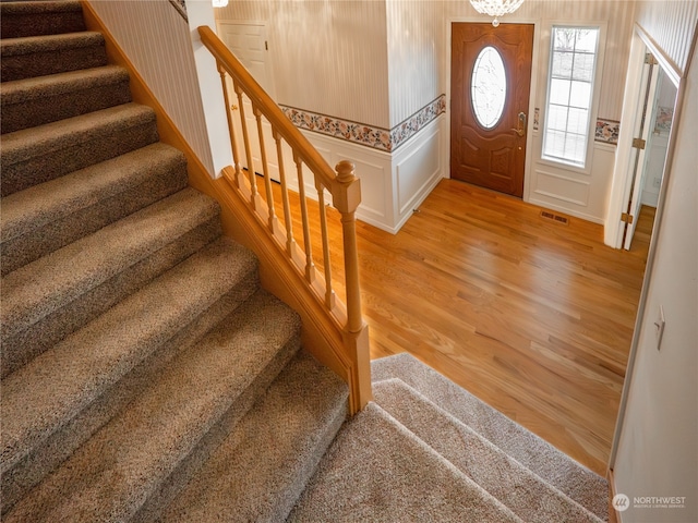 foyer entrance featuring hardwood / wood-style flooring