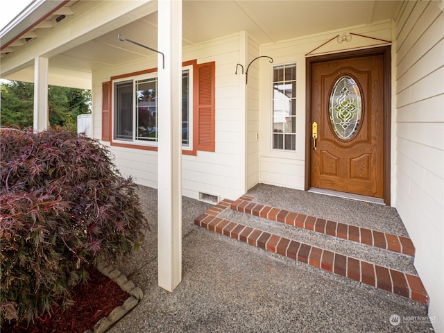 property entrance with a porch