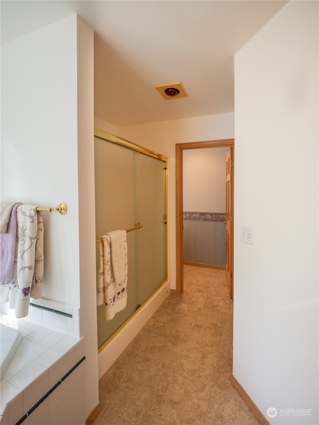 bathroom featuring walk in shower