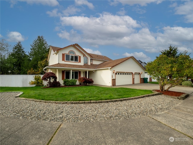 view of front property featuring a front lawn and a garage