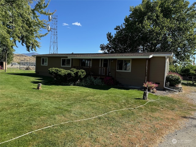 ranch-style house with a front lawn