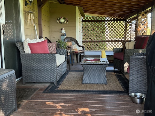 wooden deck with an outdoor hangout area