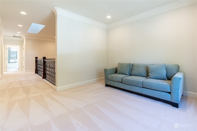 sitting room featuring light colored carpet, a skylight, and crown molding