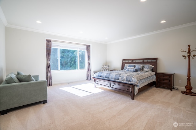 carpeted bedroom featuring crown molding