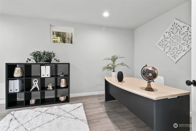 home office with light wood-type flooring