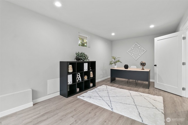 home office featuring light wood-type flooring