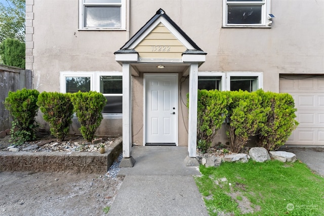 property entrance featuring a garage