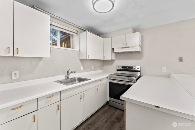 kitchen with white cabinets, stainless steel electric range, dark hardwood / wood-style floors, and sink