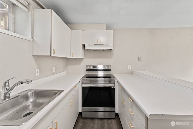 kitchen with stainless steel electric stove, sink, dark hardwood / wood-style flooring, and white cabinetry