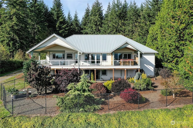 rear view of house with a balcony