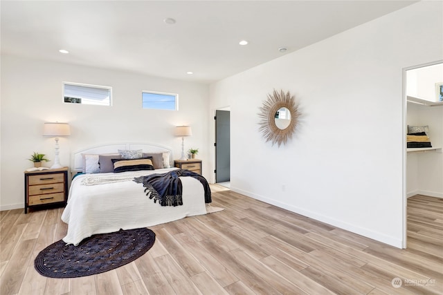 bedroom with light wood-type flooring