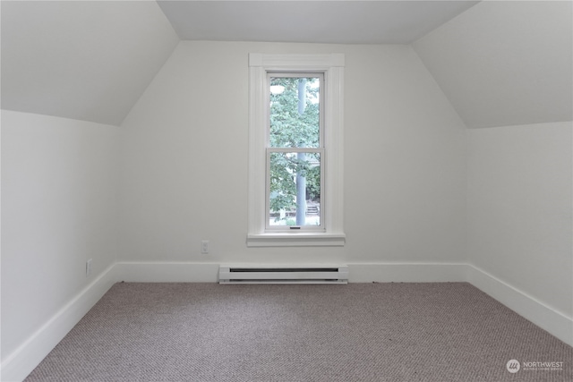 bonus room with carpet flooring, baseboard heating, and vaulted ceiling