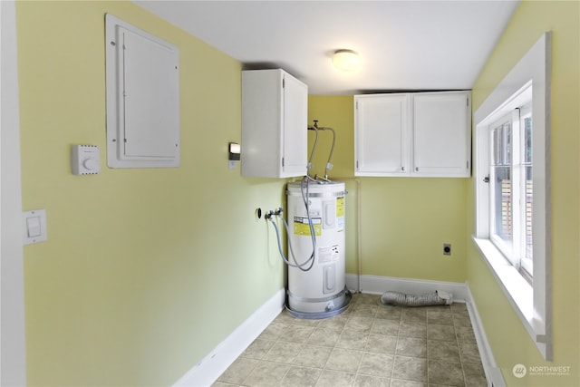 laundry area with water heater, electric dryer hookup, electric panel, washer hookup, and cabinets